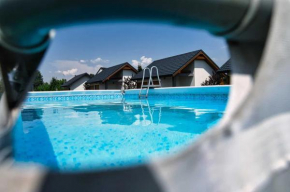 Apartamenty i Domki u Basi